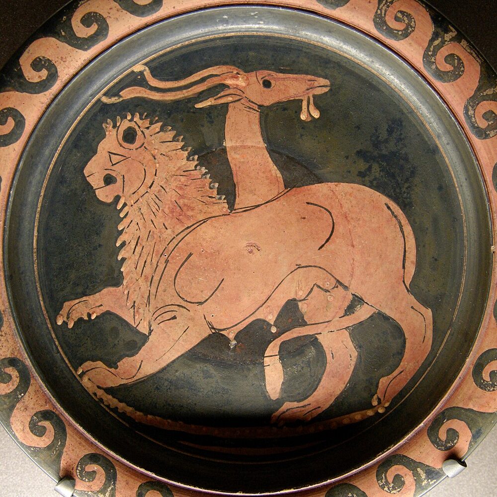 Apulian red-figure plate depicting the Chimera as a lion with a goat's head rising from its back and a serpent tail, Greek, 4th century BCE.