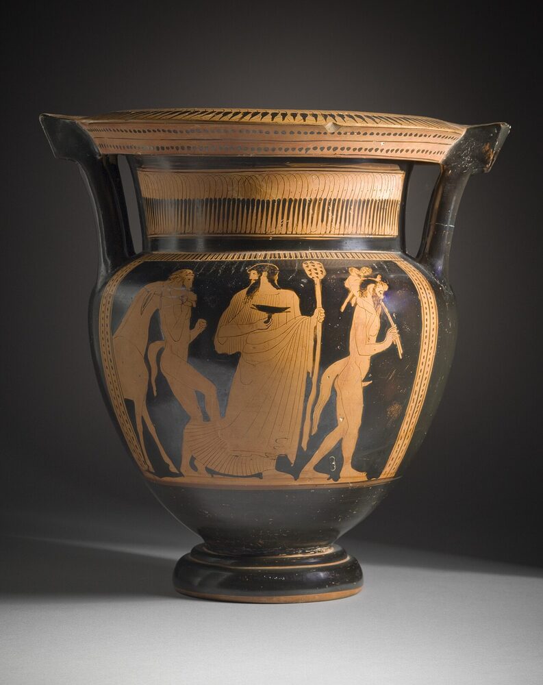 Dionysos marching between two satyrs (horse-tailed, playing pipes) in a procession, Attic red-figure column-krater, ca. 460 BCE.